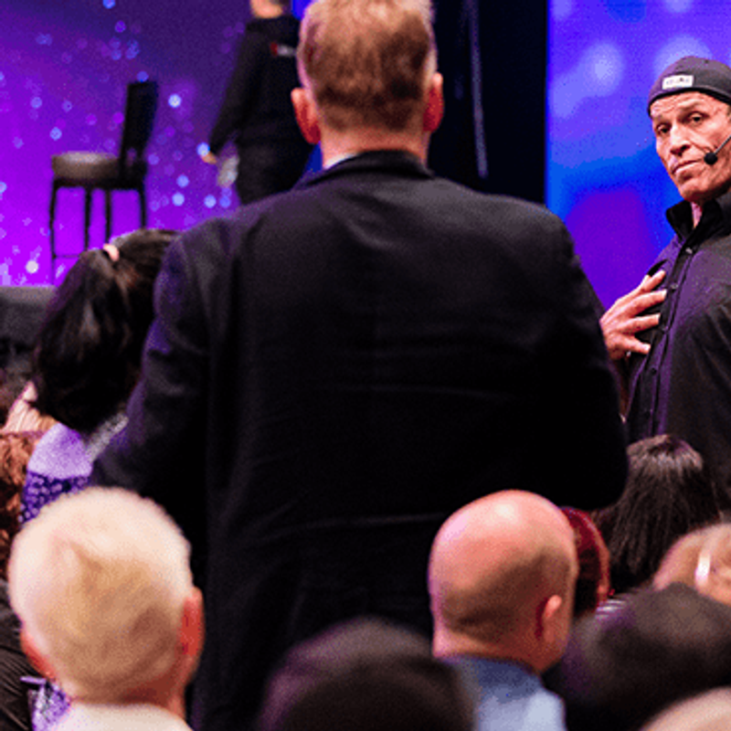 Are you with the right person? Tony Robbins talking to man in audience