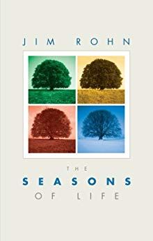 the cover of the book the seasons of life by jim rohn .