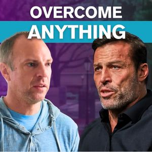 Tony Robbins and another man under the text "OVERCOME ANYTHING."