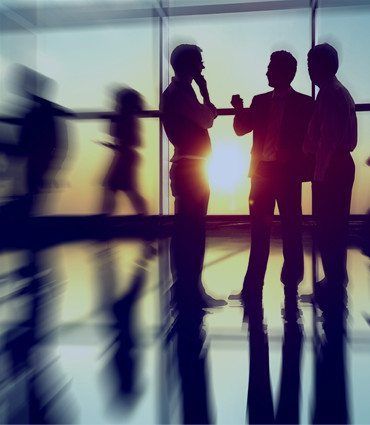 Stop being a wantrepreneur image of business people with sun in background