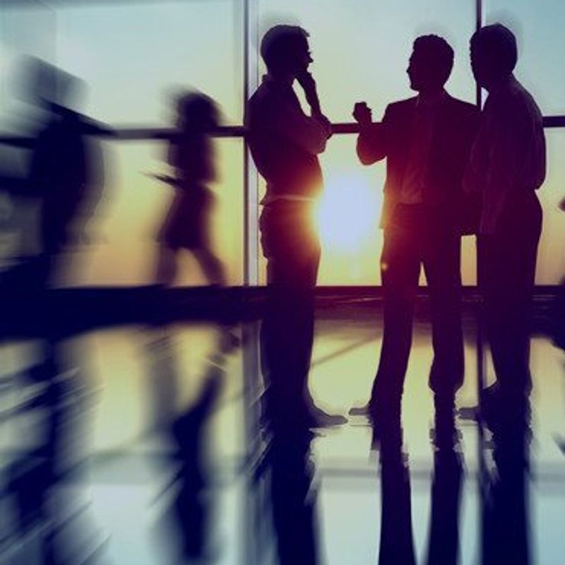 Stop being a wantrepreneur image of business people with sun in background