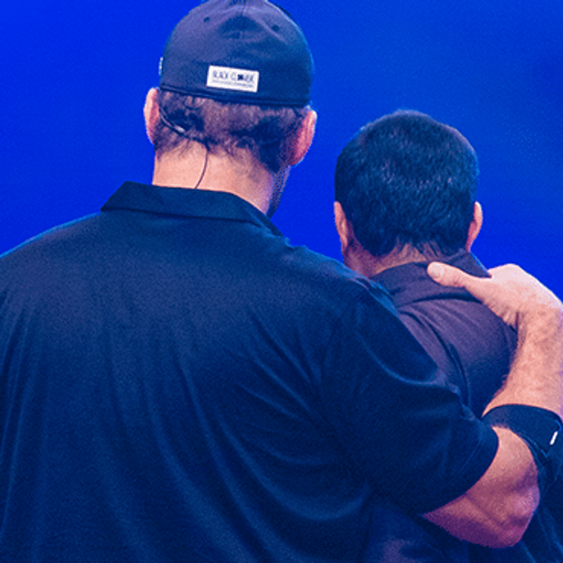 Believing that you are good enough image of Tony embracing man