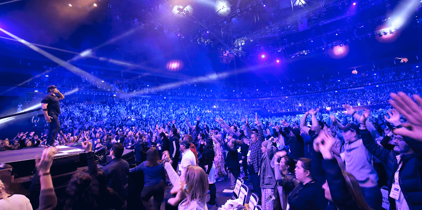 Tony Robbins on stage at event