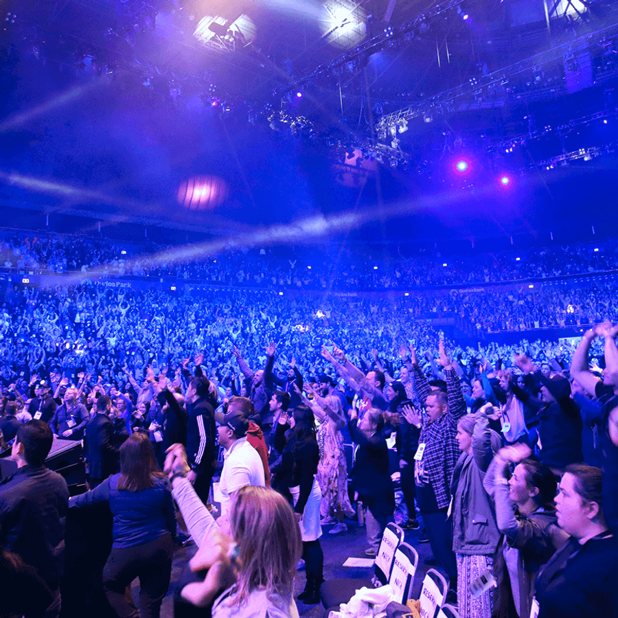 Tony Robbins on stage at event