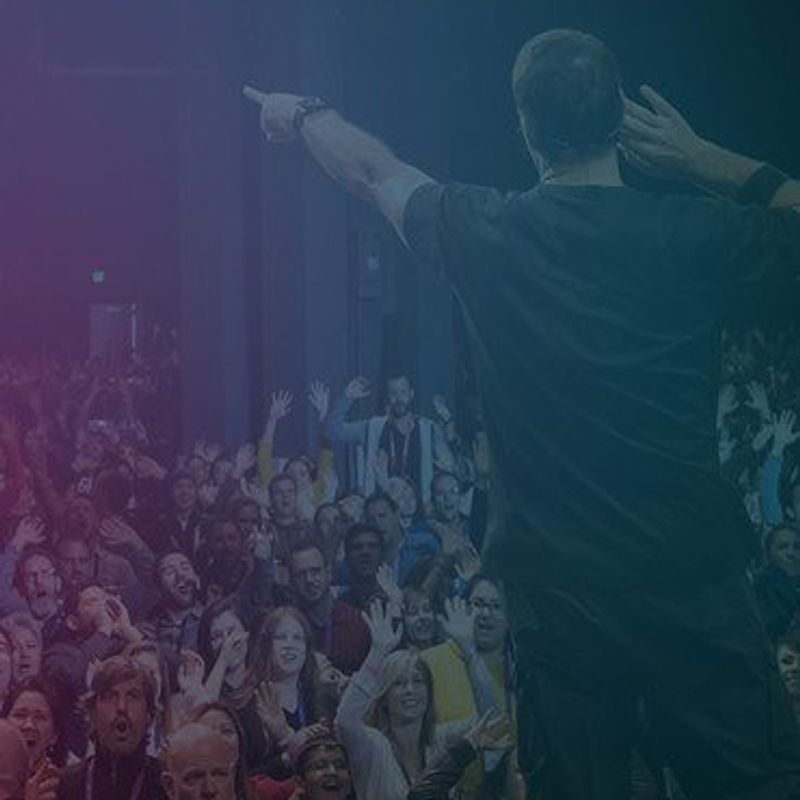 Determining your own destiny image Tony Robbins overlooking audience
