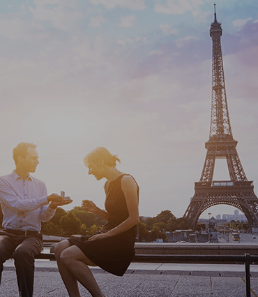 How to create life-changing moments image of man proposing to woman with Eiffel Tower in the background