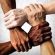 Continuing the Conversation for Healing and Unity image of a diverse group of people are putting their hands together
