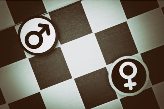 a male and female symbol on a checkered floor