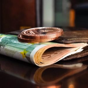 Master the current financial landscape image of a wallet filled with money and coins on a table