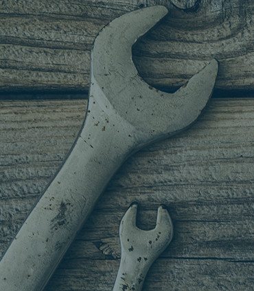 Harness the habits of billionaires image of crescent wrenches