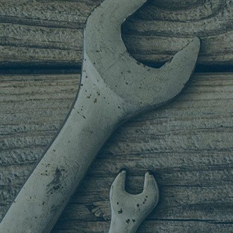 Harness the habits of billionaires image of crescent wrenches