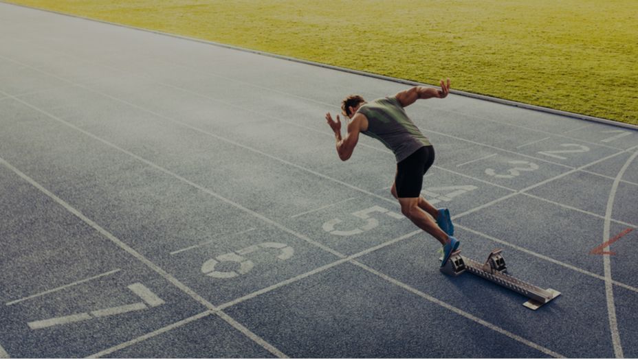 a man is getting ready to run on a track .