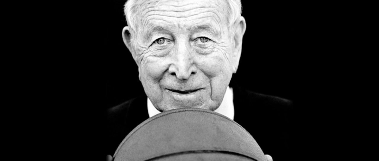 Finding fulfillment through helping others image of college basketball legend John Wooden