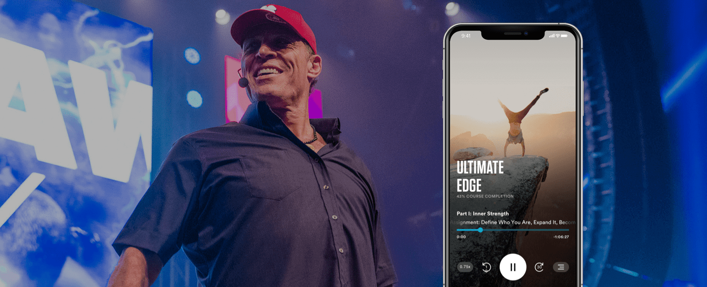 a man stands in front of a phone that says ultimate edge