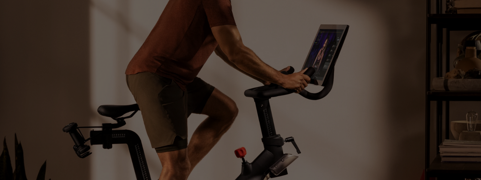 Founder & CEO of Peloton Talks Heart, Hunger & Health image of man on Peloton
