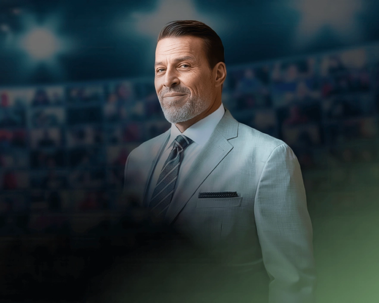 a man in a suit and tie stands in front of a crowd