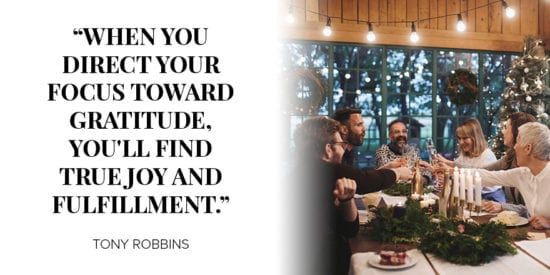 People celebrating around a holiday dinner table