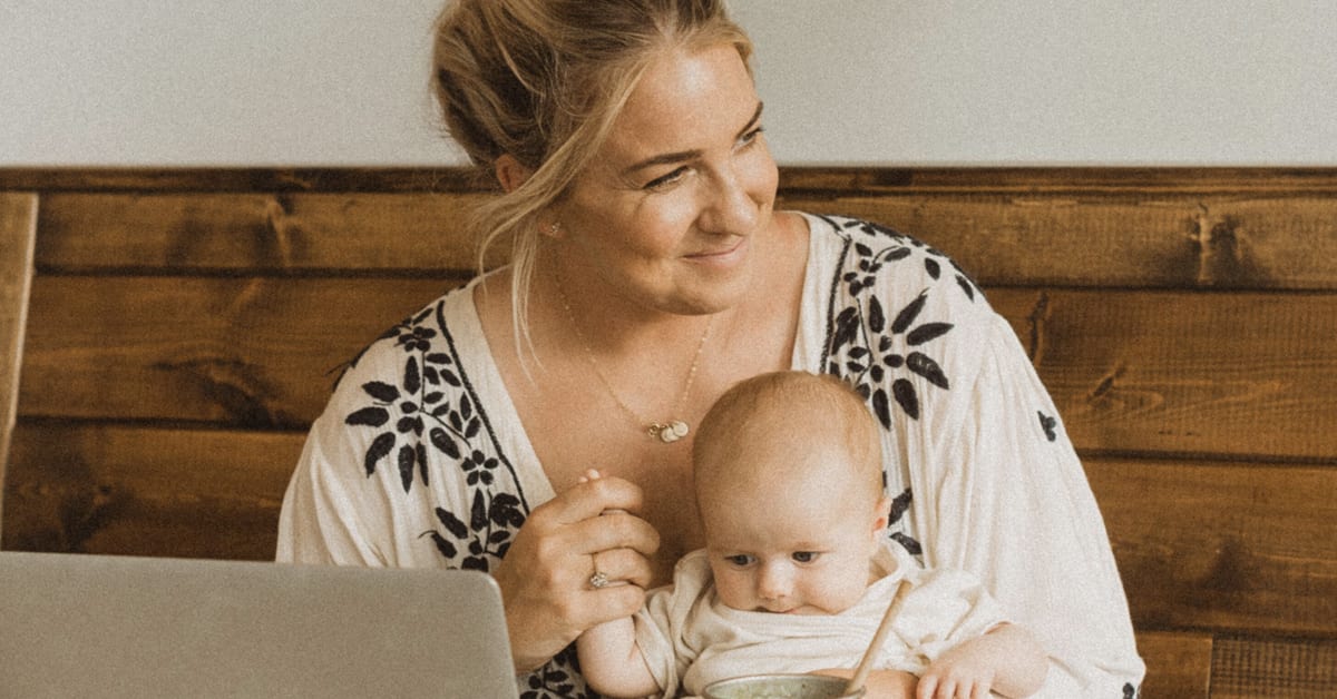 How to be more productive image of Jenna Kutcher with baby behind laptop