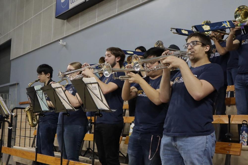Trumpets playing.
