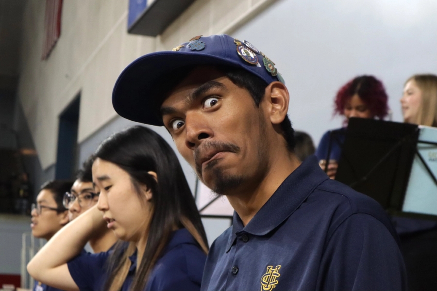 Boy makes a weird face.