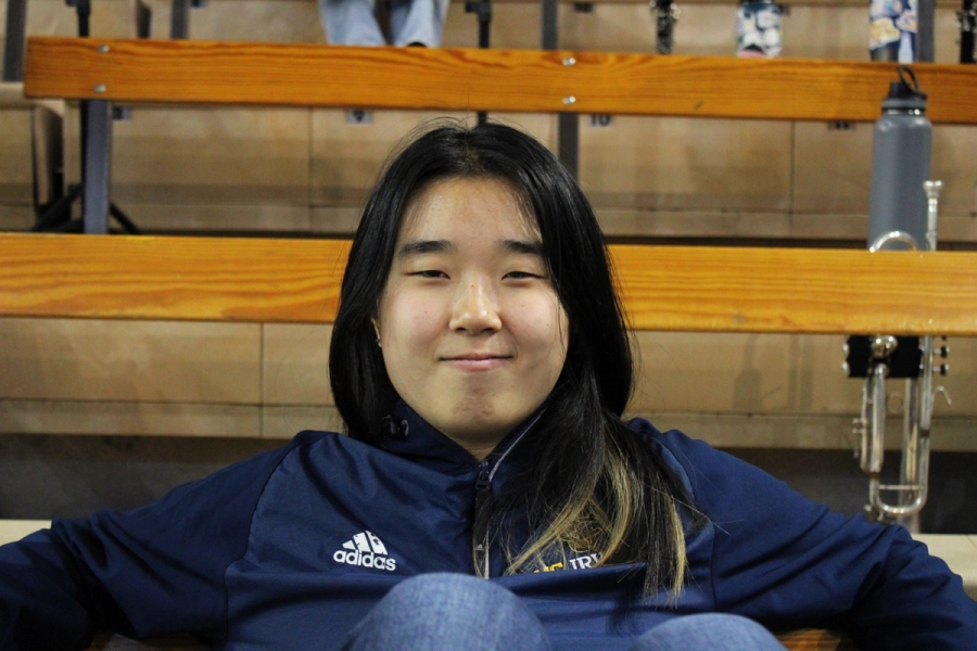 Girl looking smug at the camera.