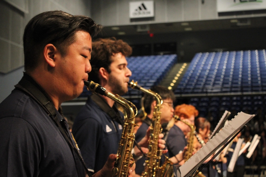 Alto saxes playing.