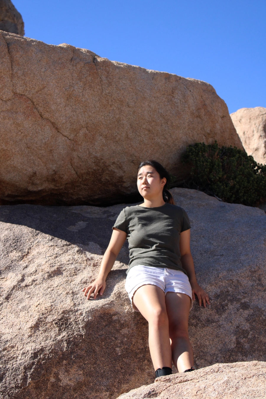 Korean girl looking into the distance.