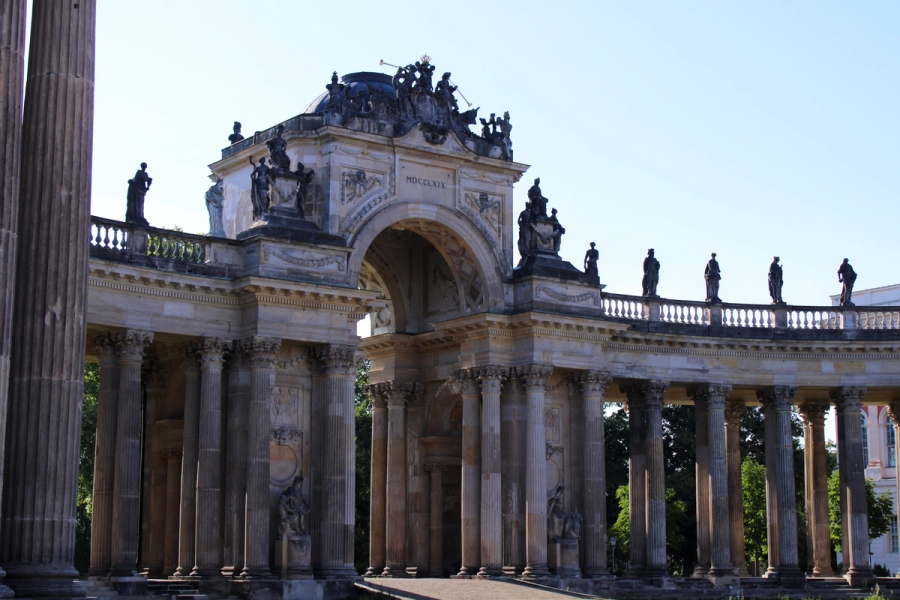 Pathway with pillars and arches.