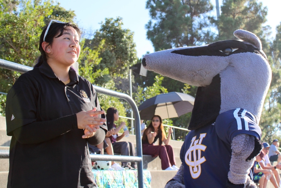 Girl talking to Peter the Anteater.