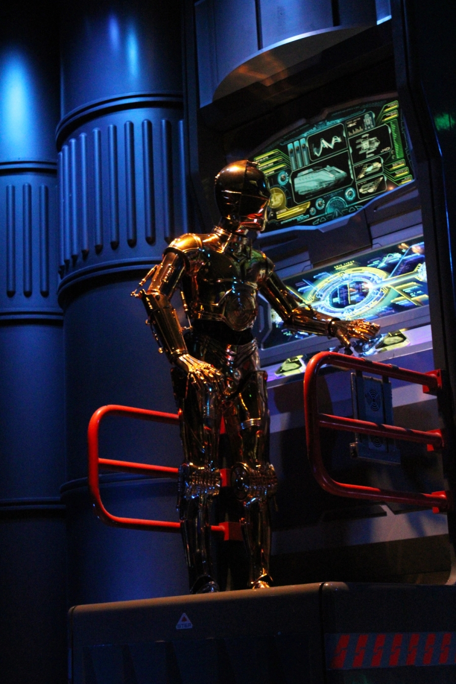 C-3PO working a console.