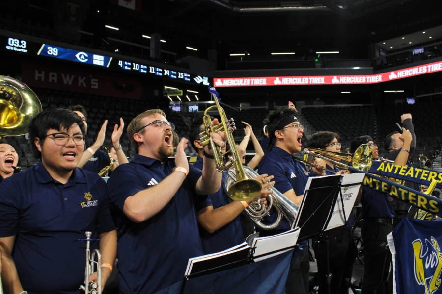 Band cheering and clapping.