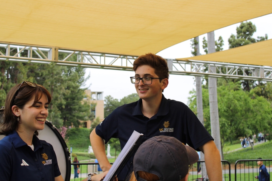 Two percussionists talking to each other.