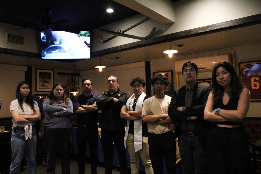 Serious trombone section photo.