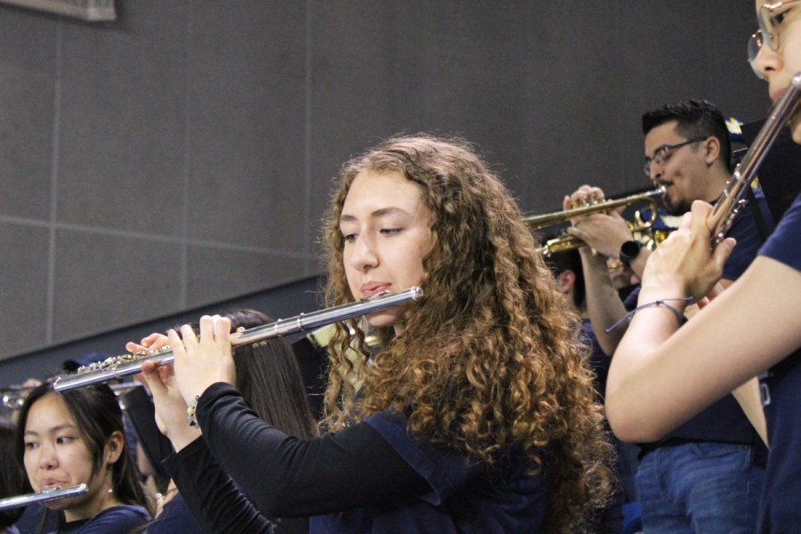 Girl playing the flute.