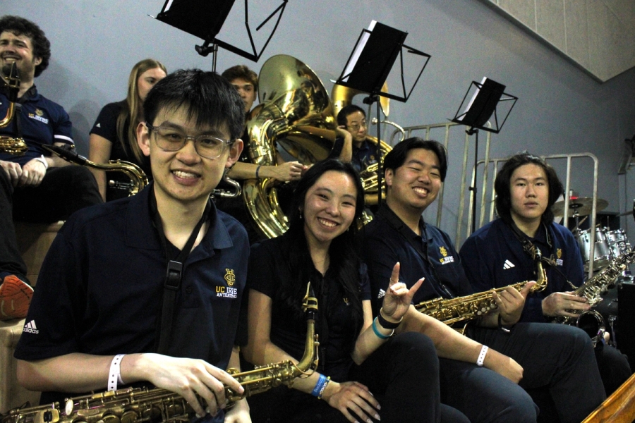 Alto saxes smiling.