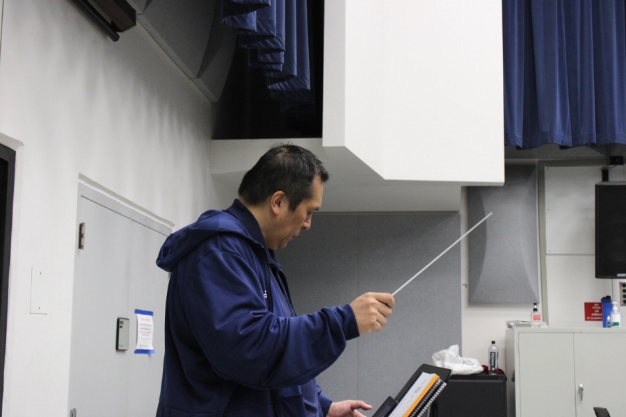 Director conducting.