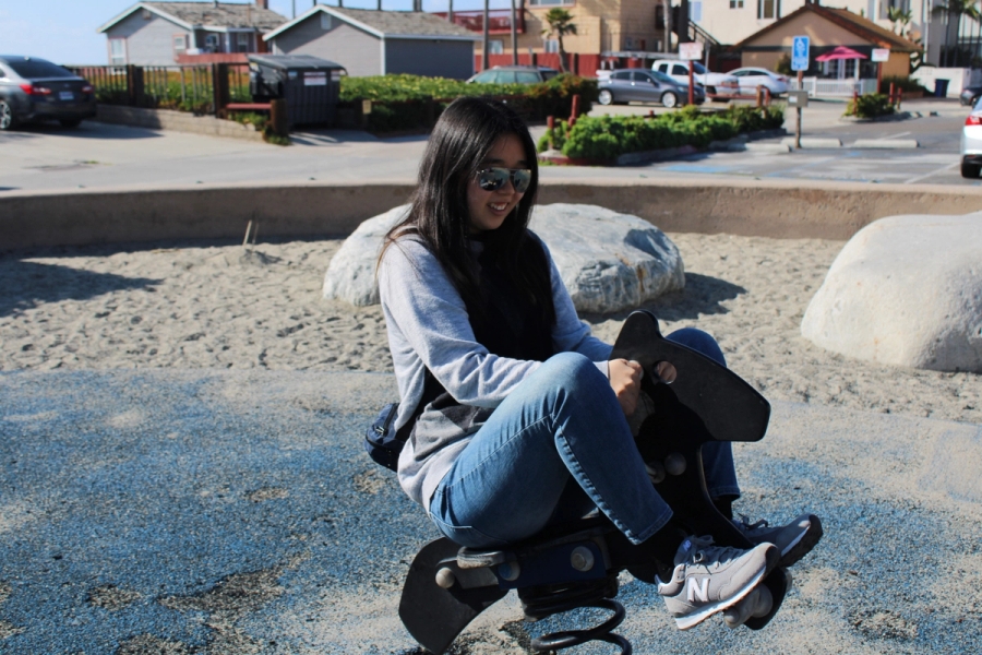 Girl riding a horse attraction.