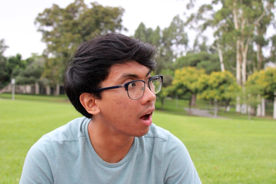 Boy looks shocked.
