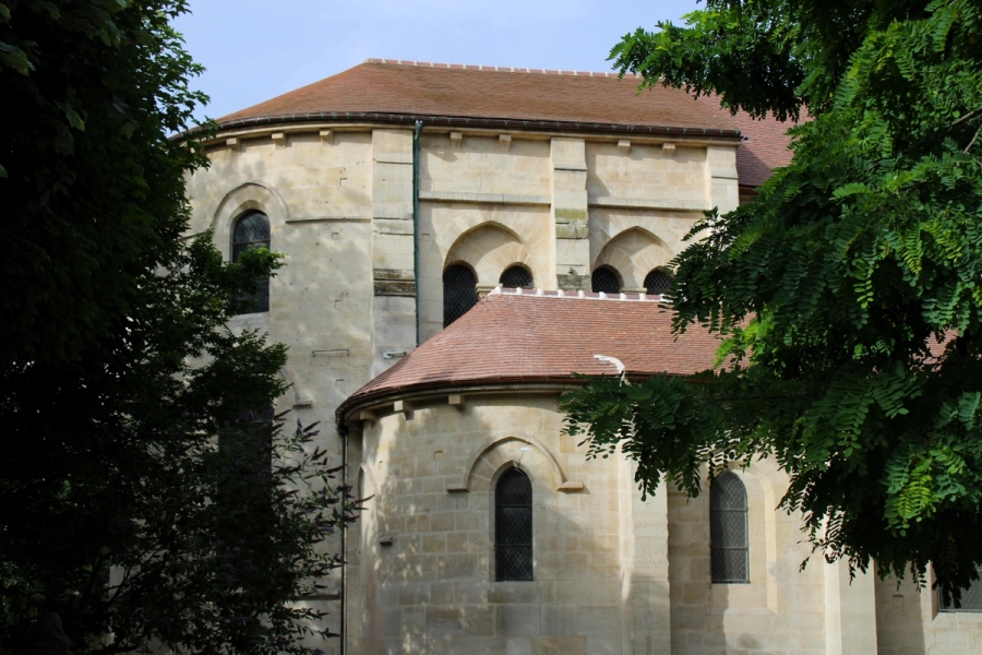 White building with red roof.