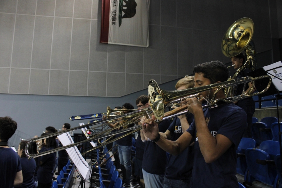 Trombones playing.