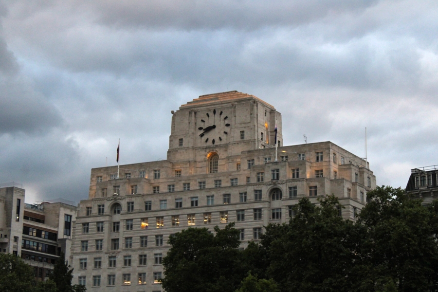 White building with minimalistic clock.