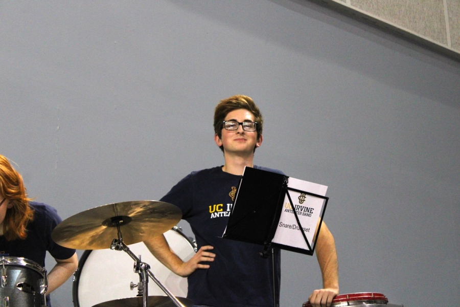 Boy posing on snare.