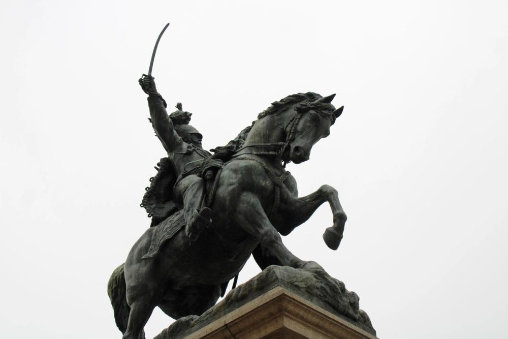 Low POV of soldier statue.