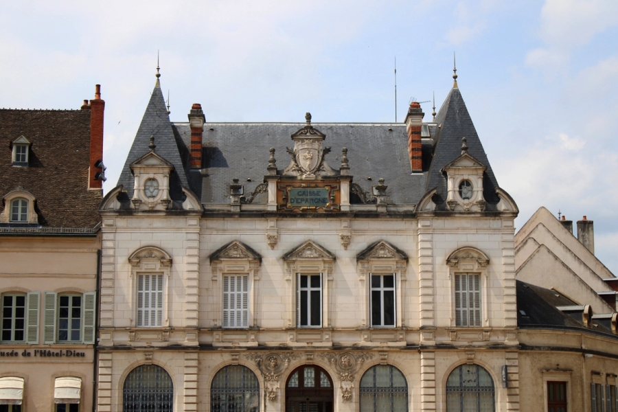 Front of building with stores.