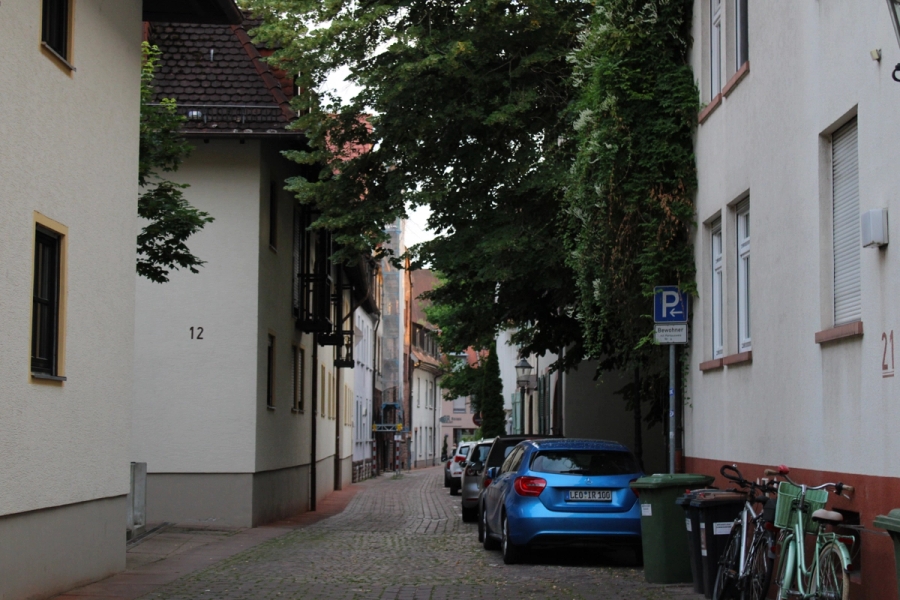 Street parking in between buildings.