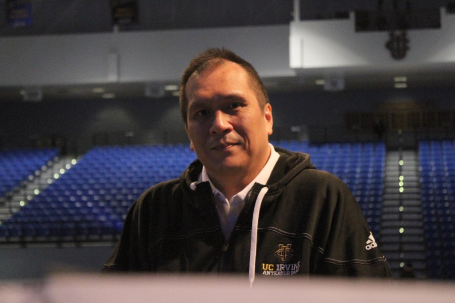 Band director staring at the camera.