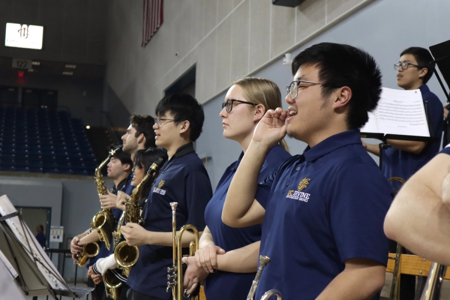 Trumpets and altos watching the game.