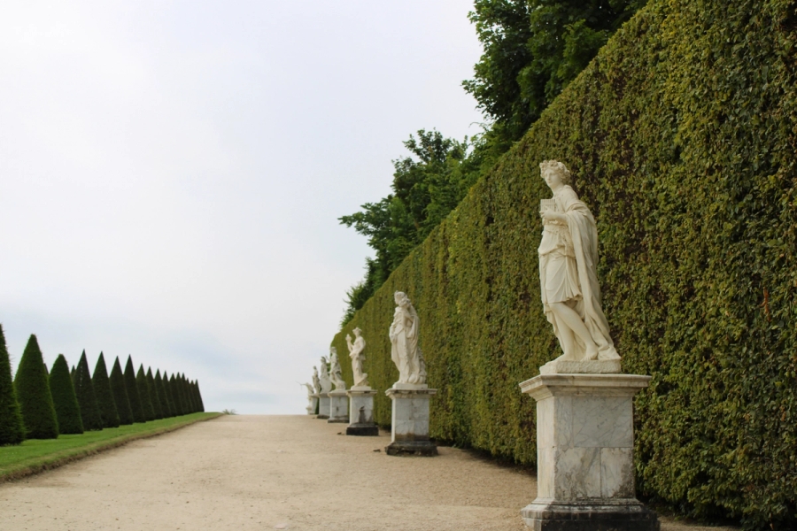 Statues lined up along the pathway.