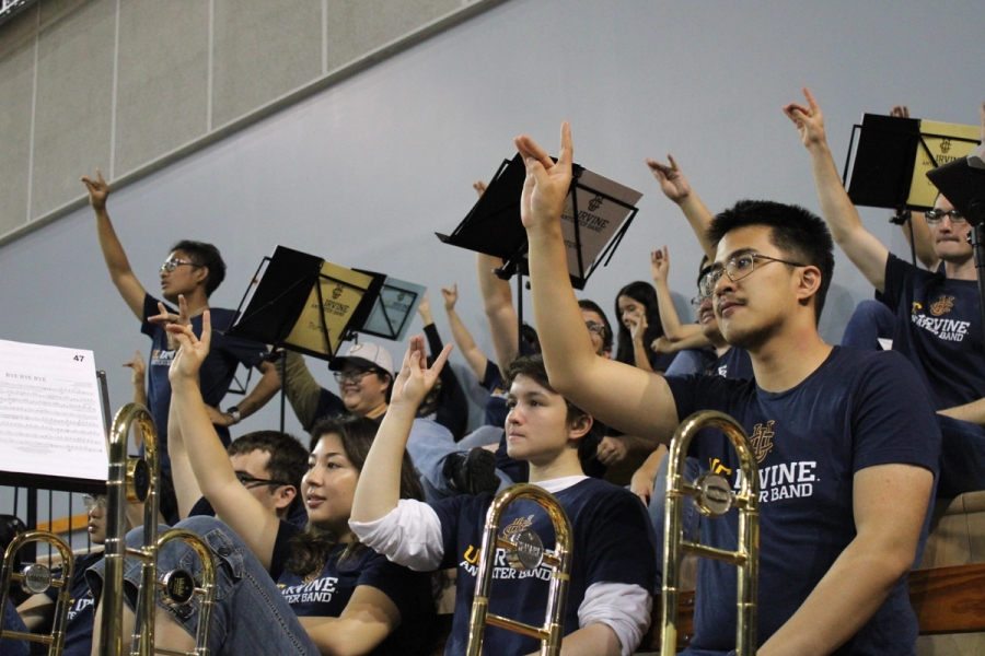 Trombones and trumpets hold up "zots".