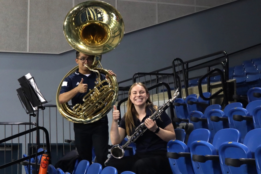 Tuba and bass clarinet players smiling.